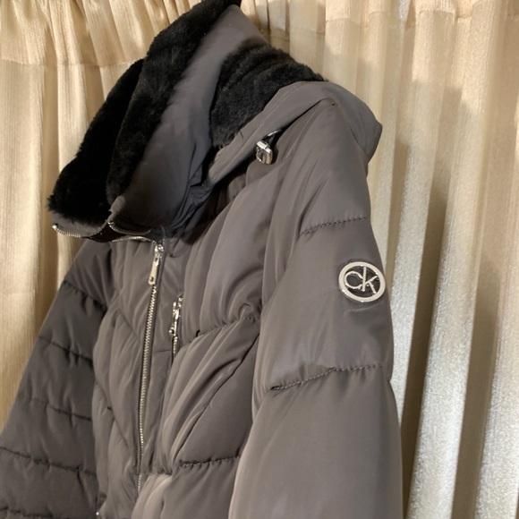 Calvin Klein Puffer jacket. Size Large. Color Gray with black faux fur. - Picture 6 of 13
